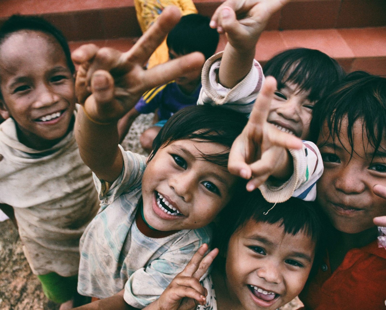Image of cheerful kids smiling at camera