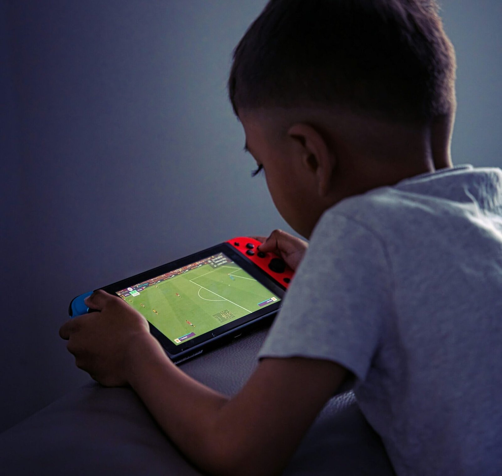 Image of kid playing video games