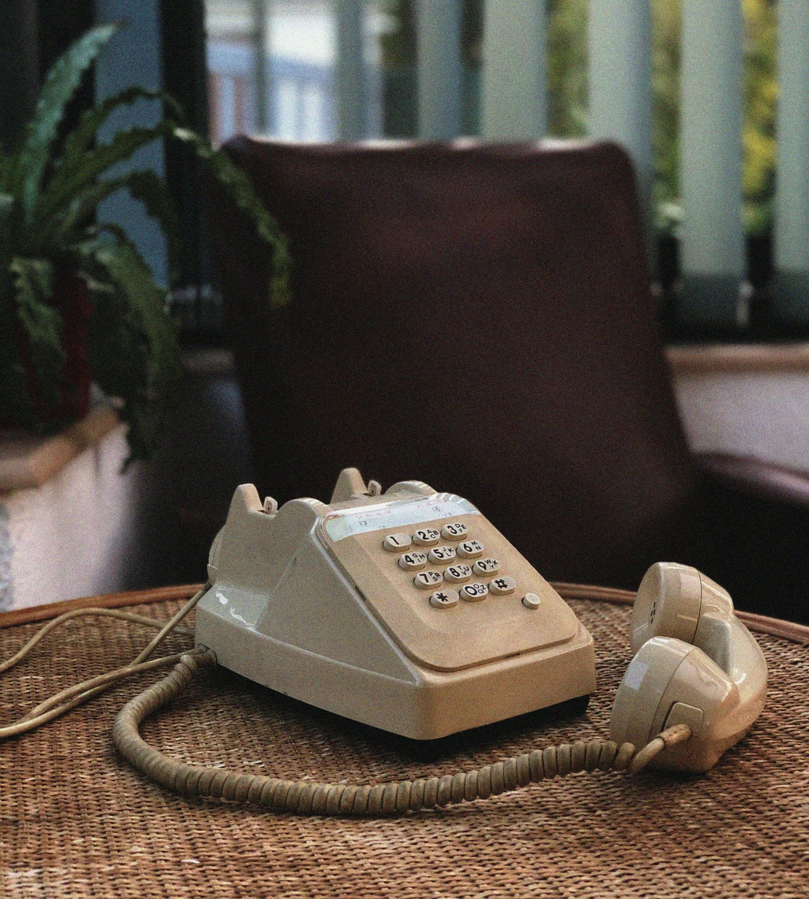 Image of white telephone on table.