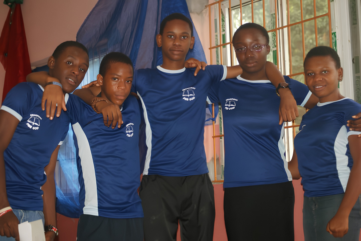Kids posing for camera at Royal Arrows camp